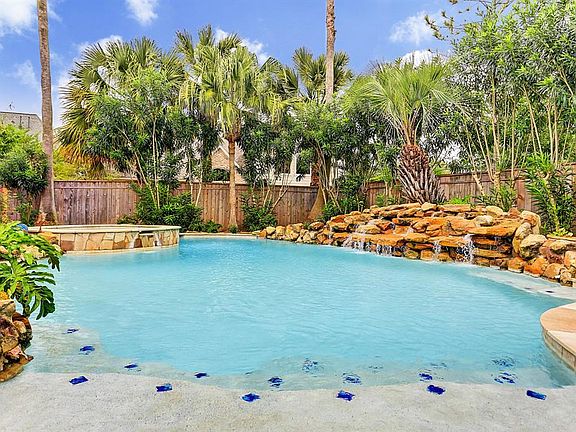This sparkling pool and spa can be heated for year round use. The Pentair IntelliTouch controller with ScreenLogic Interface can be accessed remotely from your smart phone or tablet. The pool was re-plastered in 2014 and several of the components wer