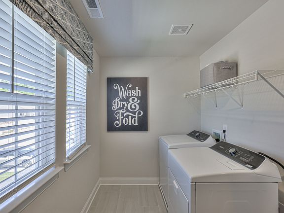 Spacious laundry rooms come complete with a Whirlpool 174 washer and dryer.