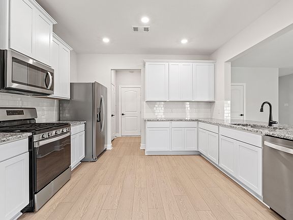 The kitchen of the Rayburn has energy-efficient appliances.