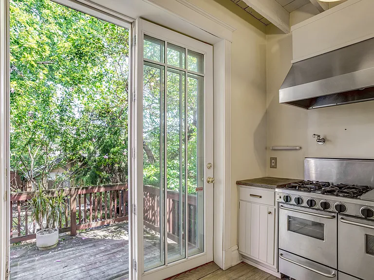 Sliding door to deck off of the kitchen