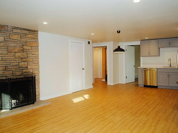 Functional fireplace in this spacious living area