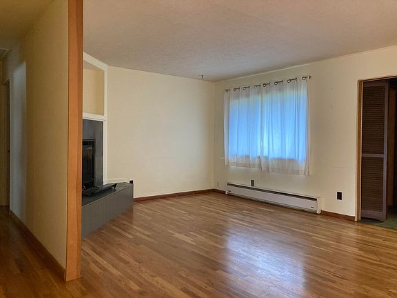 Living Room- different angle- door to entry area on left edge (entry closet there as well)