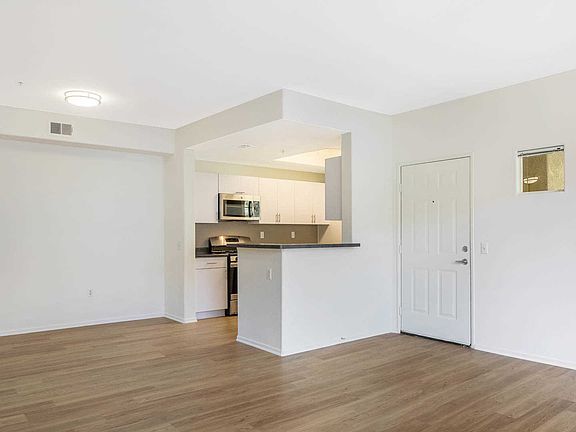 Kitchen and Dining Room with Hard Surface Flooring
