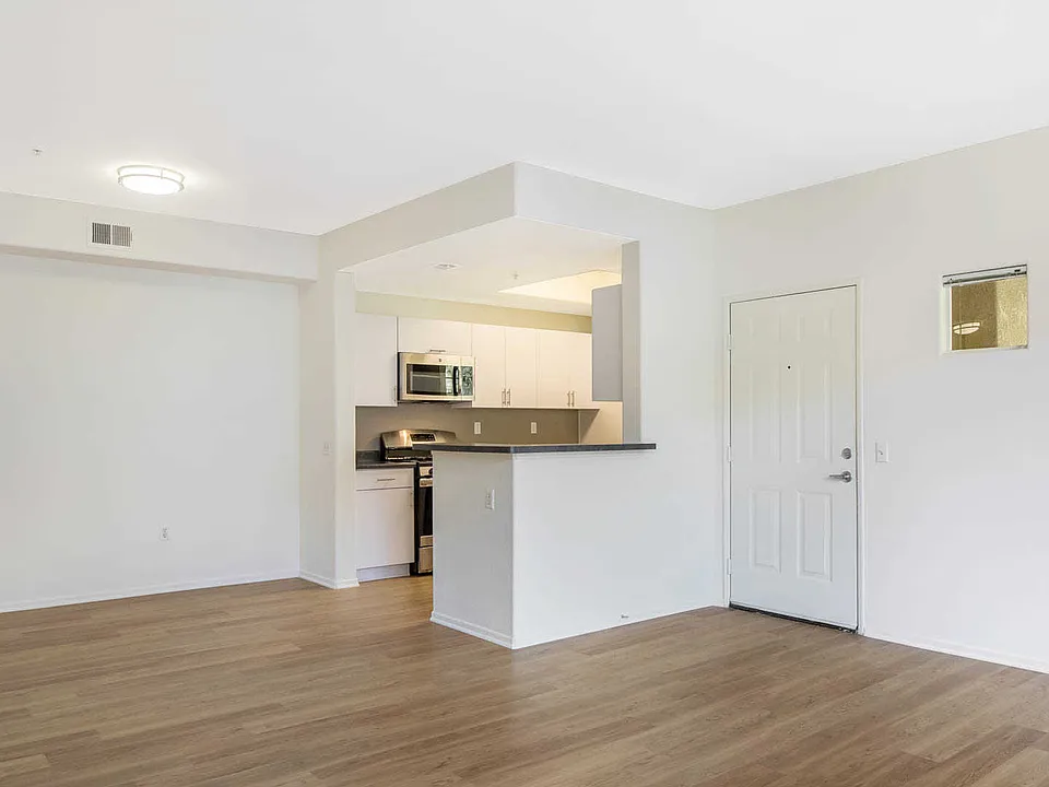 Kitchen and Dining Room with Hard Surface Flooring