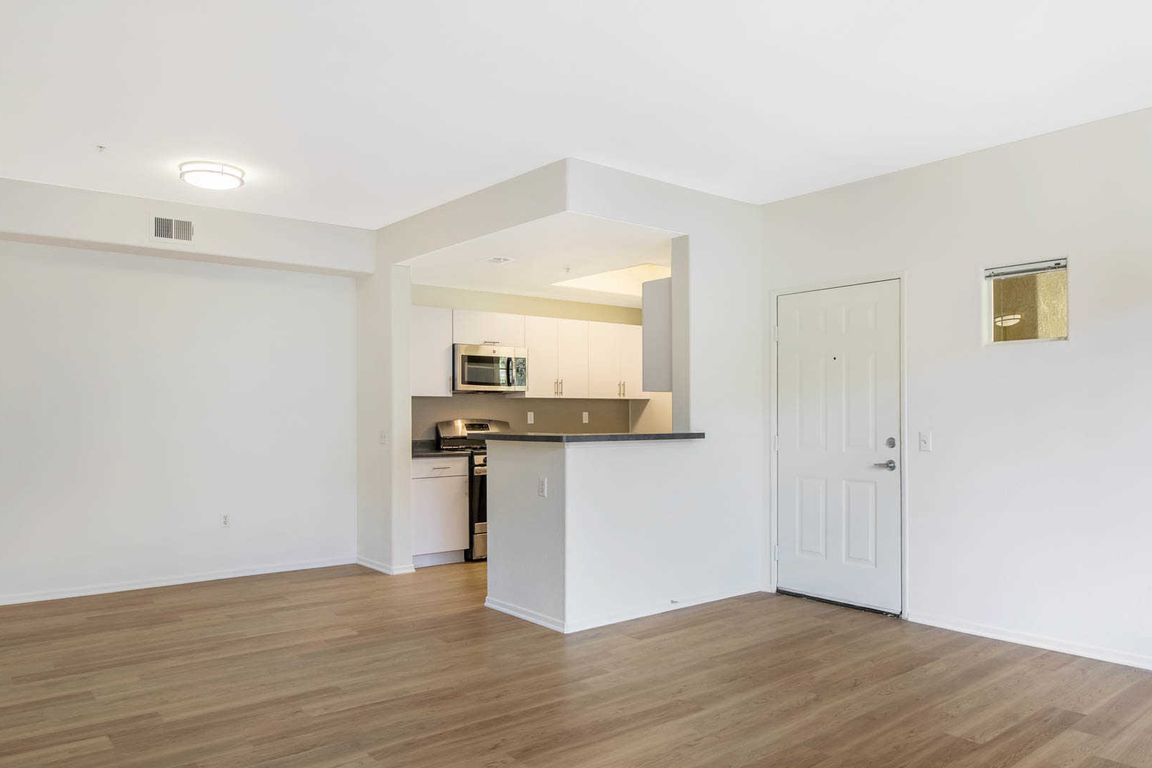 Kitchen and Dining Room with Hard Surface Flooring