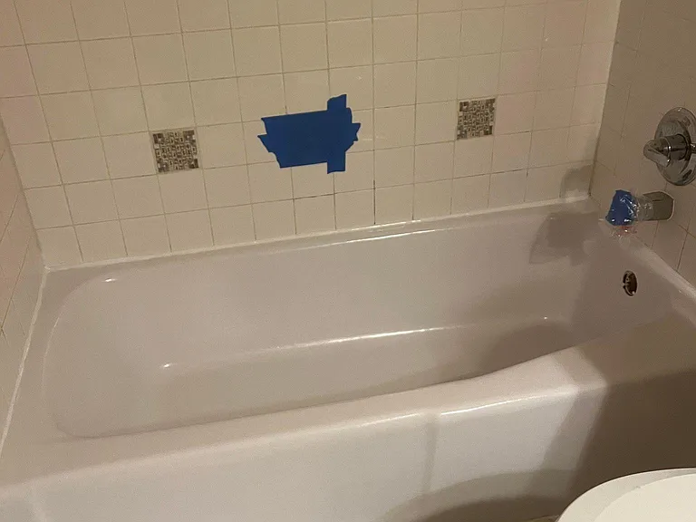 Guest Restroom Bath and Shower - Blue tape will have tile fixed.
