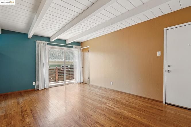 Living room opens to balcony via sliding glass door