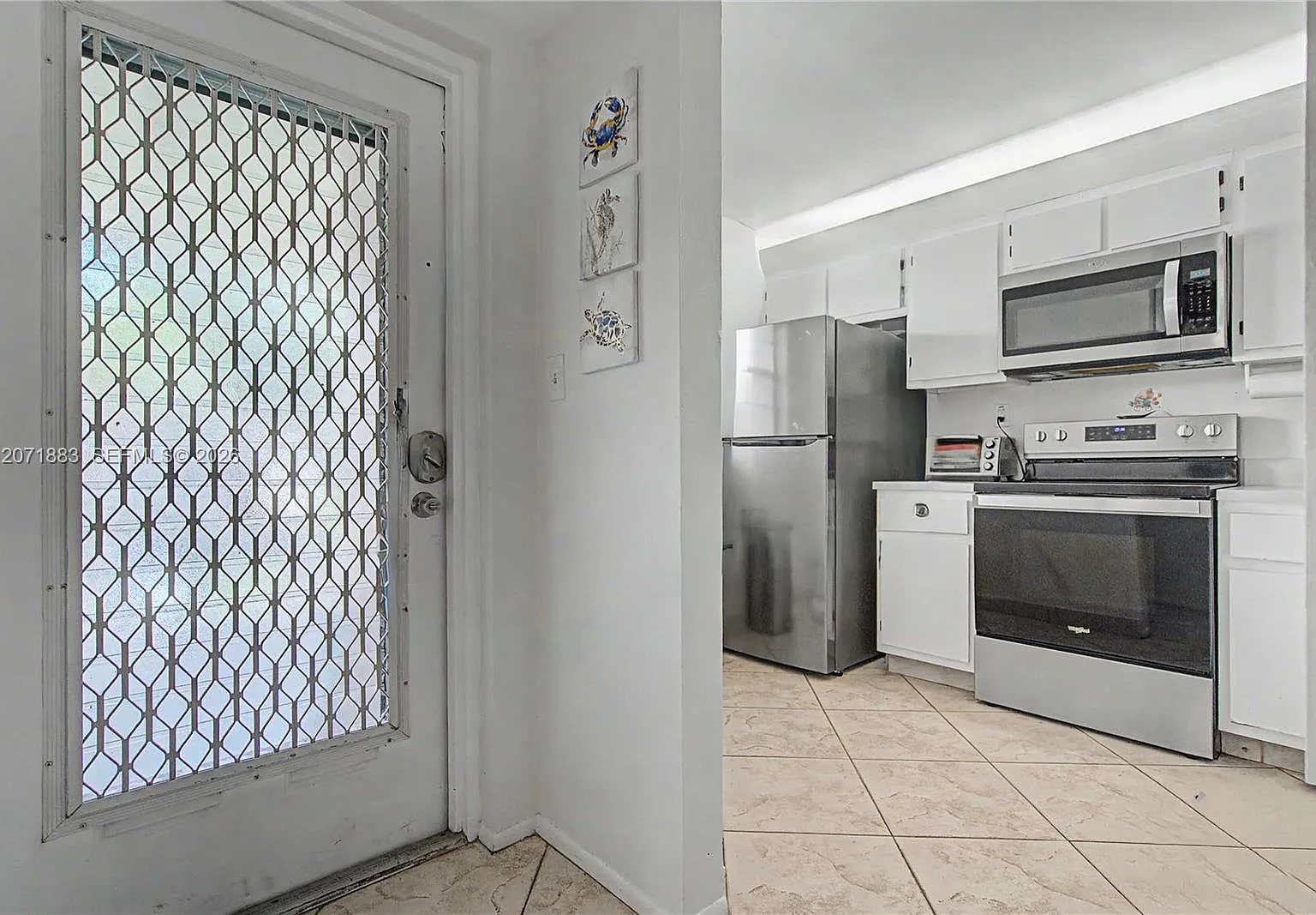 9520 Seagrape Dr — Photo 3