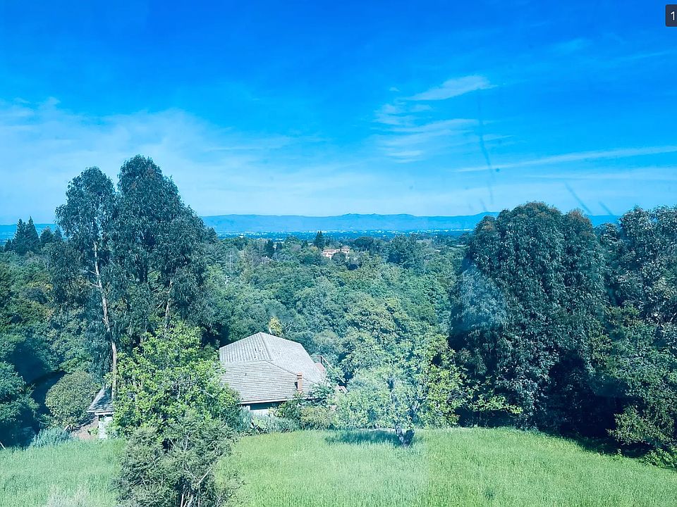 Panoramic view of San Francisco Bay and mountains. This house is located in Palo Alto Unified School District, one of the best in the nation.