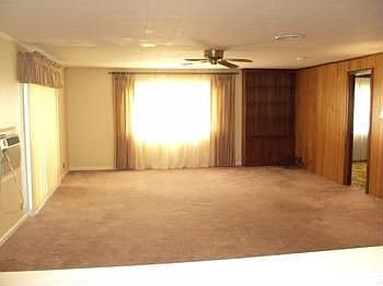 Large living room open to the kitchen.