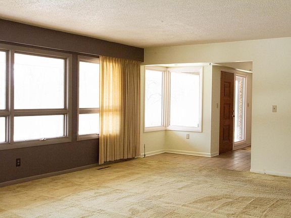 Living area looking back to entry foyer
