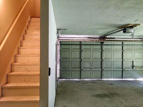 Garage and staircase to apartment
