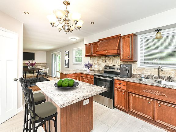 5th image of 6211 E 55th Pl