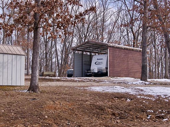 As a bonus the over size carport and shed will be staying with the home.
