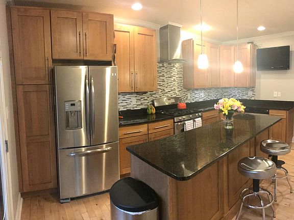 Kitchen with Stainless Steel Appliances and Granite Countert