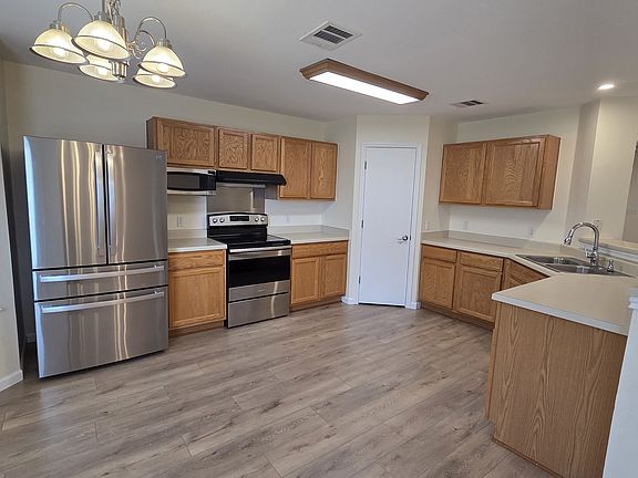 Open Kitchen with bar top and new appliances.
