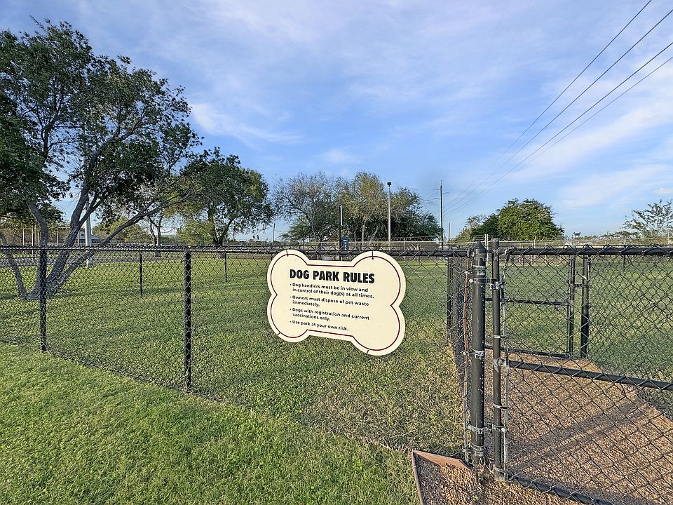 Secure dog park where residents can enjoy outdoor time with pets at Los Cedros Apartments in Brownsville, TX.