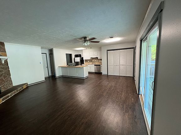 Living room, Kitchen, Laundry closet view