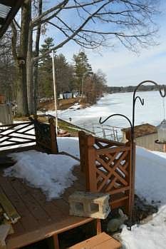 back deck off of the eclosed 3 season porch.