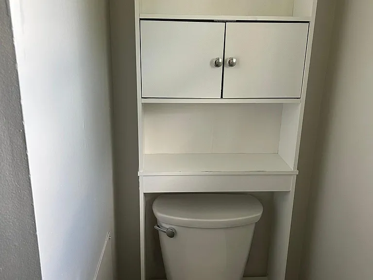Main bath storage over toilet provides even more storage space