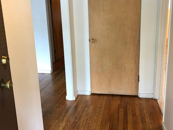 Entry, kitchen on the right and living/ dining on the left