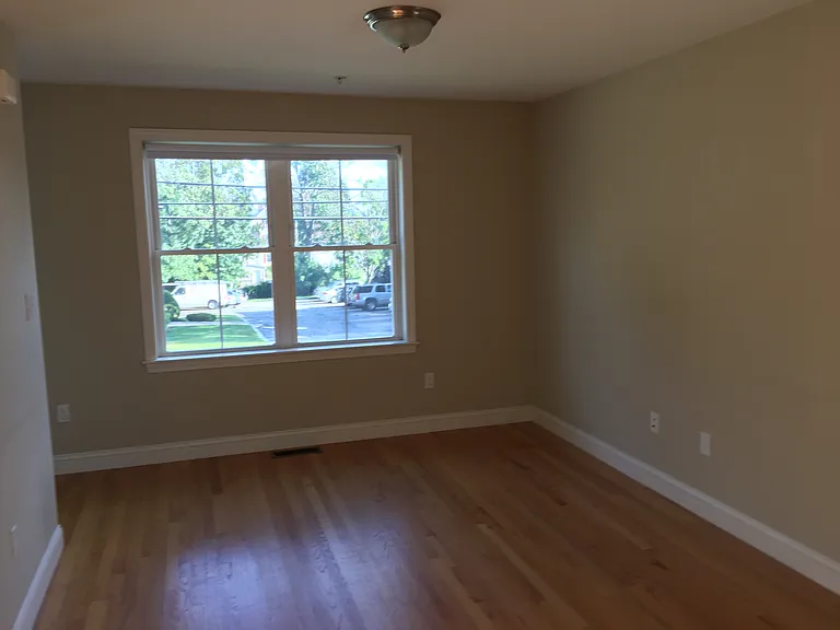 Living room area shown without furniture.