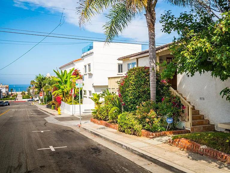 TWO BLOCKS from sand and surf!
