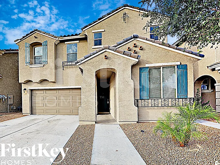 12061 W Rowel Rd — Photo 1
