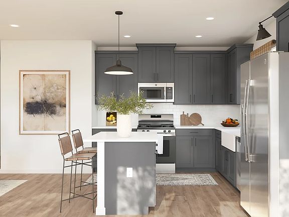 Kitchen with floating shelves and pendant lighting