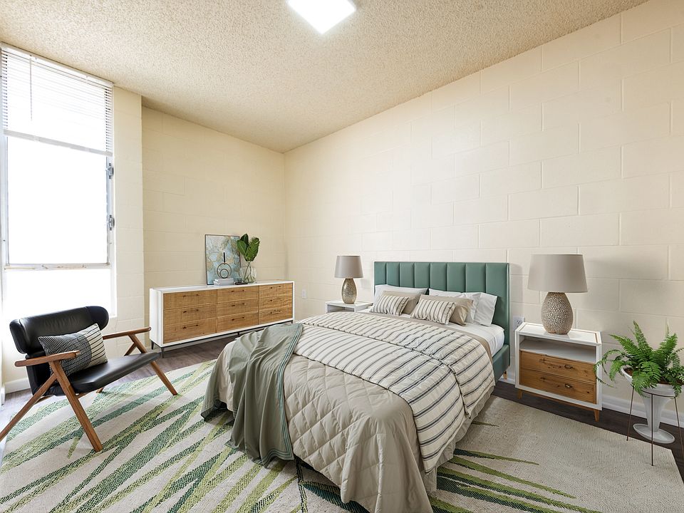 Roomy bedroom with plenty of natural light and an inviting ambiance.