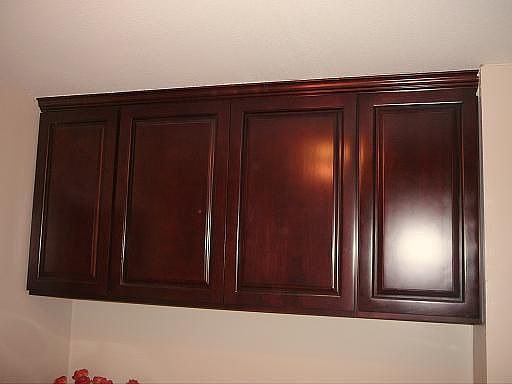 Mathcing cherry cabinets.