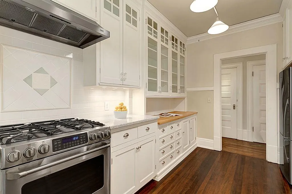 Kitchen with original cabinetry - 615 Boren Ave #28