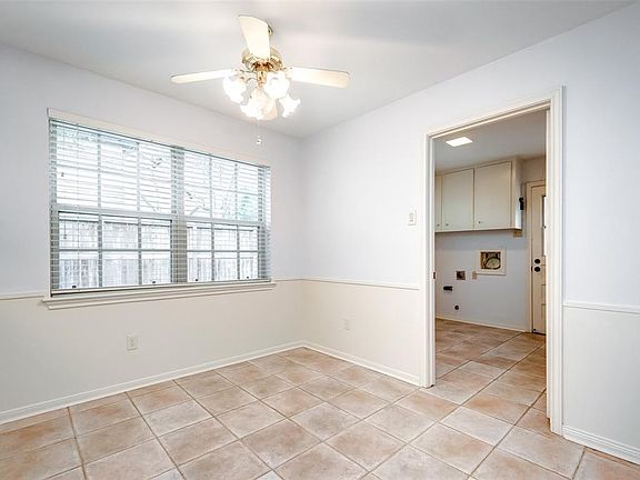 Breakfast room with laundry room and half bath through the doorway