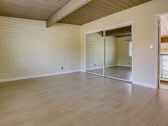 Entire second floor dedicated to a spacious, fully enclosed bedroom retreat with private ensuite bath _ loft-inspired layout with added privacy. Features a full-length mirrored sliding closet and bright, indirect natural light."