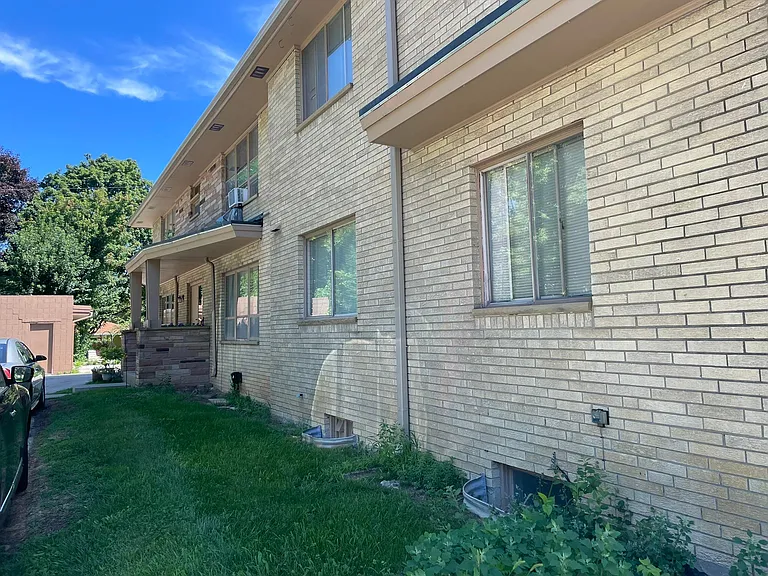 Side view of building. Access to apartment is on the side near the back