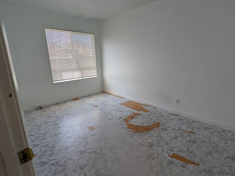 Bedroom 3 (floor stickers have been removed, floor is laminate)