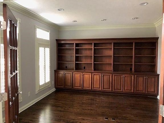 Freshly painted Repose Gray clean and fresh. Big Den/Office room with wall of cabinets to enjoy.