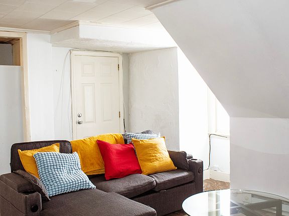 Living room, facing toward entrance of unit.