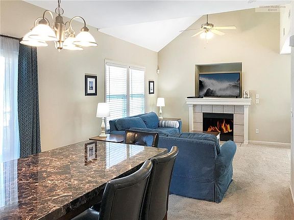 Fire in fireplace is simulated.