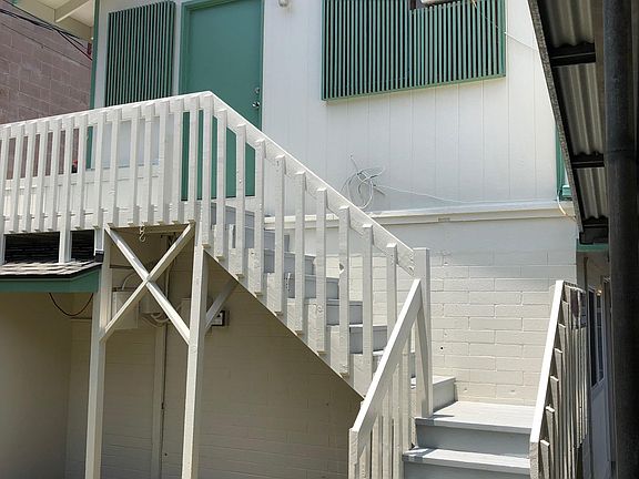 Small Deck at back stairway.