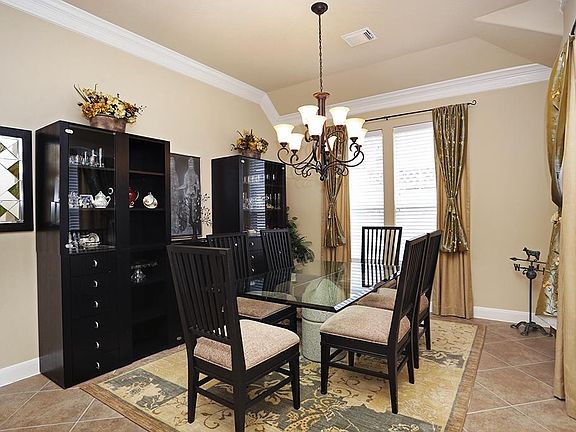 Your new formal dining room is generously sized an can comfortably accommodate large family gatherin