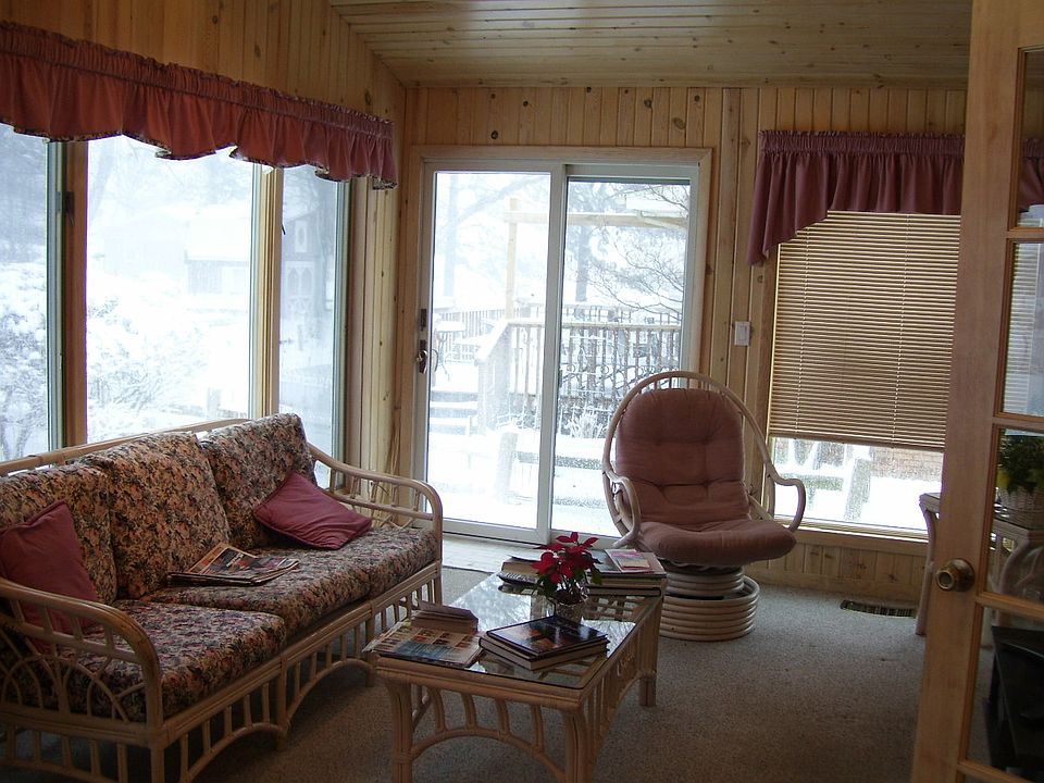 Sunroom provides access to patio.