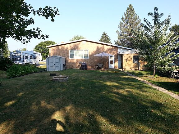 back yard with patio area & firepit - shed stays