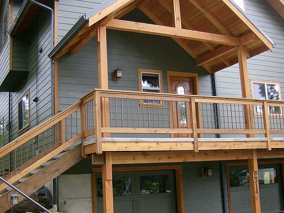 Extensive use of Fir beams and posts for decks and accents. Concrete decks. 