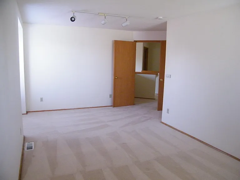Large family room upstairs, could be used as 4th bedroom.