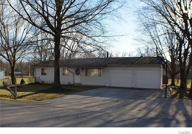 Mature trees and extra parking in the front of the house