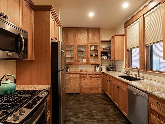 Recently remodeled Kitchen. Cabinet straight ahead is original, all other cabinetry were upgraded.