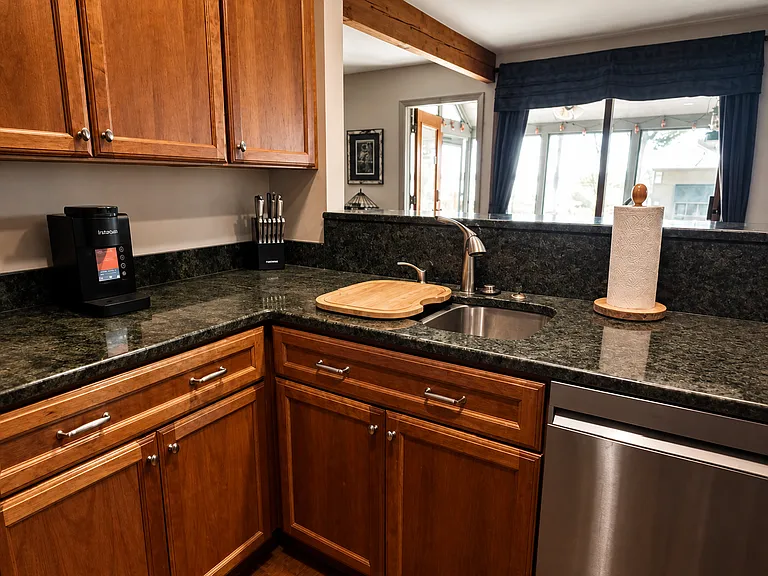 Washing dishes while overlooking Lake Winnipesaukee