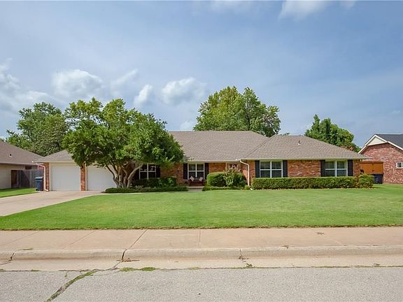 Another view of the front - house faces south and gets good light - nice large trees for shade. Windows in this home have all been replaced. Heat and air was recently moved overhead. Sewer line was replaced, 50 gallon hot water heater about 3 yrs old.