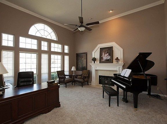 Beautiful fireplace and wall of windows